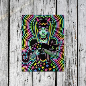 May include: A digital illustration of a woman with black hair and horns, wearing a black dress with stars and a black choker. She is holding a black cat with green eyes. The background is a swirling pattern of rainbow colors.