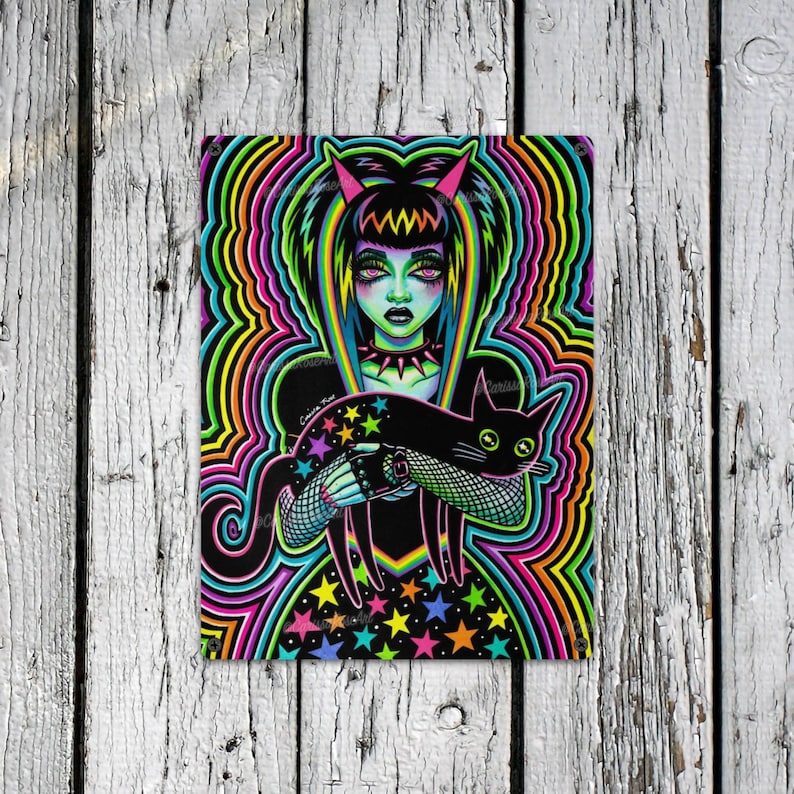 May include: A digital illustration of a woman with black hair and horns, wearing a black dress with stars and a black choker. She is holding a black cat with green eyes. The background is a swirling pattern of rainbow colors.