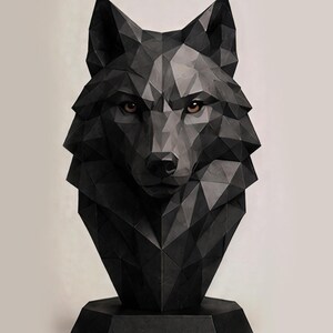 May include: A black wolf head sculpture featuring a geometric, faceted design. The bust is composed of numerous triangular planes that form the animal's features, including pointed ears and a snout. The eyes are brown, and it sits on a base.