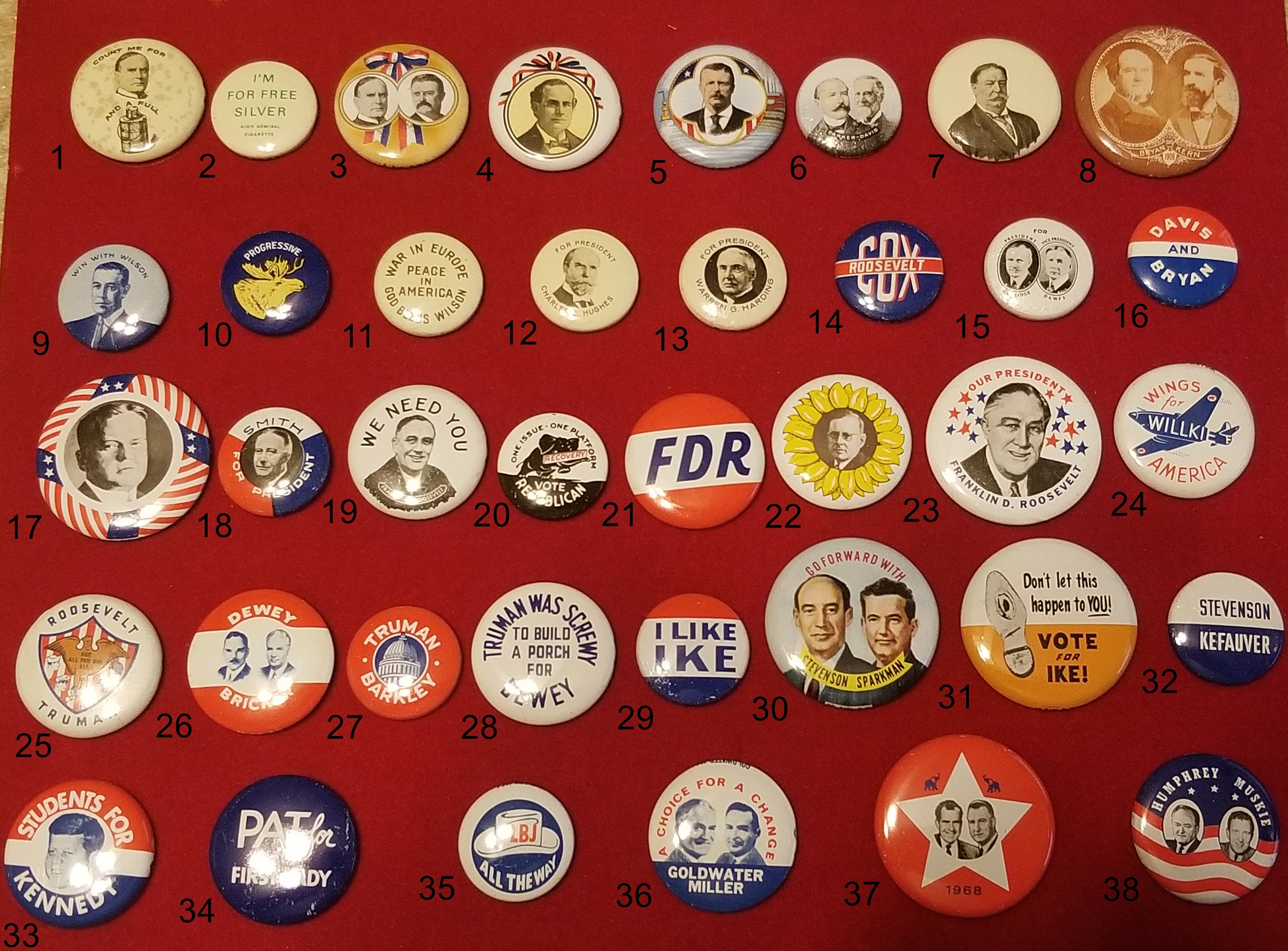 Lot - POLITICAL CAMPAIGN PIN-BACKS Housed in a three-ring binder