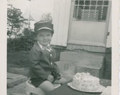 Birthday Boy Wearing a Pilot s Hat with Wings, a Suit with Short Pants and Bow Tie in Front of His Birthday Cake, Vintage Photo