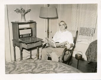 Happy Man Reading the NY Daily News In A Thonet Style Rocking Chair, Vintage Photo