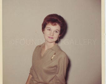 Woman Leaning Against a Taupe Wall Posing for the Camera, Lovely Blur, Soft Tonal Lighting, Vintage Photo, Color Snapshot