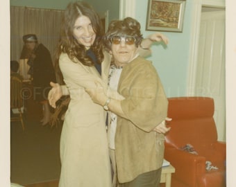 Short Man Wearing Awful Toupee & Oversized Sunglasses Trying to Dance With Pretty Laughing Woman, Vintage Photo, Color Snapshot, Funny