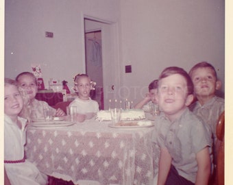 Children’s Birthday Party in Dining Room With Lit Candles on Cake, Lace Tablecloth, Boys and Girls,  Vintage Photo, Color Snapshot