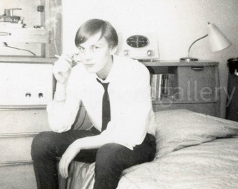 Cool Hipster Smoking in his Bedroom on Christmas Mid Century Modern