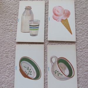 Tarjeta de memoria con imágenes de fonética española antigua: leche, helado, plato, taza... ¡Tu elección!