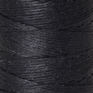 May include: Close-up of a spool of black waxed thread. The thread is tightly wound and has a smooth, polished finish.