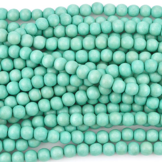 thumbnail image 2 of Aqua Blue Round Natural Wood Beads – 20mm Large Hole – 16 Inch Strand – The Bead Chest 2 of 4