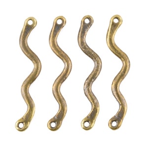 May include: Four gold-colored metal connectors with a wavy design. Each connector has a small hole at each end.
