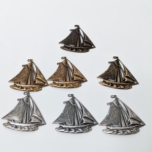 Assorted metal brass ship stampings, 40 mm, silver oxidized, bronze oxidized