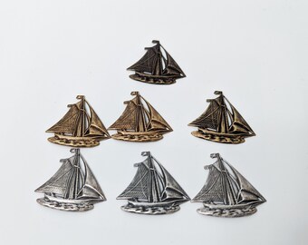 Assorted metal brass ship stampings, 40 mm, silver oxidized, bronze oxidized