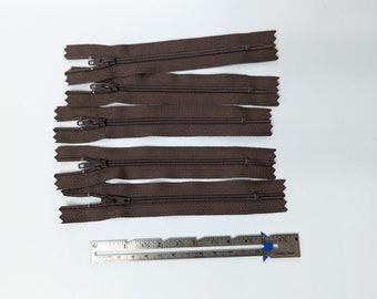 Five 5" brown zippers, YKK brand, #3 nylon zippers