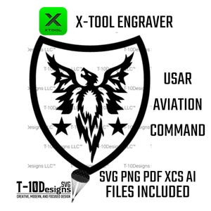May include: A black and white graphic design featuring a phoenix within a shield, with the text "X-TOOL ENGRAVER" and "USAR AVIATION COMMAND." Includes SVG, PNG, PDF, XCS, and AI files. The logo for T-10Designs is also present.