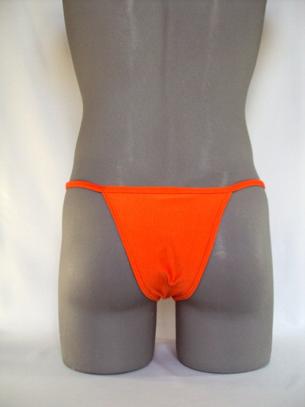 Is it OK for men to wear thong bikinis at the beach? – Orange