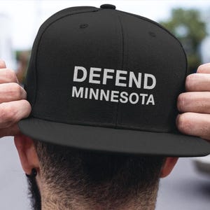 Defend Minnesota Embroidered Snapback Hat — Minimal Statement Cap