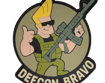 Parche de moral DEFCON BRAVO de PVC – Parche táctico con diseño de fusil y cierre de velcro para equipo de tiro, chaleco portaplacas y mochila.