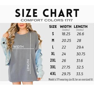 The image is a size chart for a gray t-shirt, providing measurements for different sizes (S, M, L, XL, XL, 2XL, 3XL, 4XL) and corresponding width and length measurements (18.25, 26.6, 29.4, 30.75, 32.5, 27.75, 29.75, 33.5).
