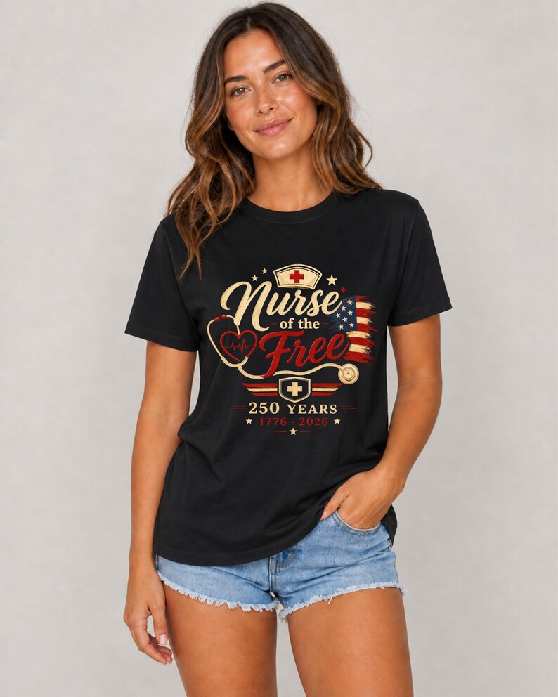 May include: Black t-shirt with the text "Nurse of the Free" in gold script, a red cross, and a stethoscope design. The shirt also features the American flag and the text "250 YEARS * 1776 - 2026 *."