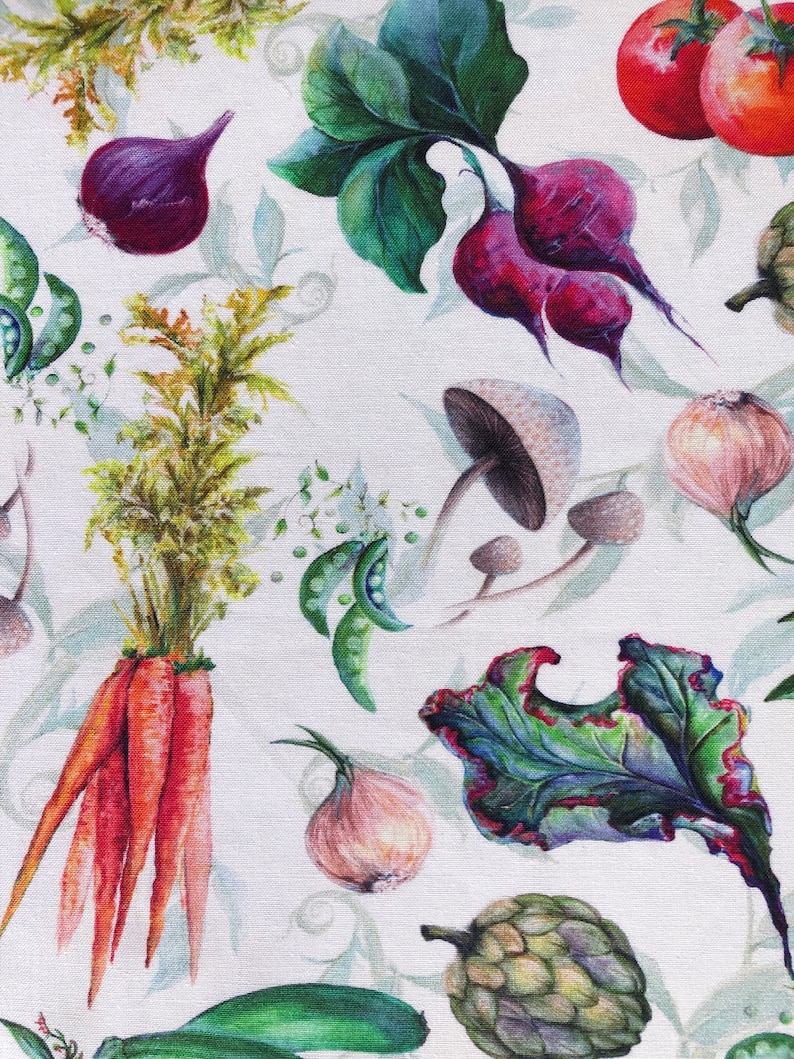 A seamless repeating watercolor pattern on crisp white cotton fabric featuring an array of realistic, vibrant organic garden vegetables. The design includes detailed illustrations of bright red tomatoes on vines, orange carrots with bushy green tops, deep purple beetroots with leafy greens, light green artichokes, white garlic bulbs, and dark purple onions, all interspersed with green leafy foliage against the solid white background.