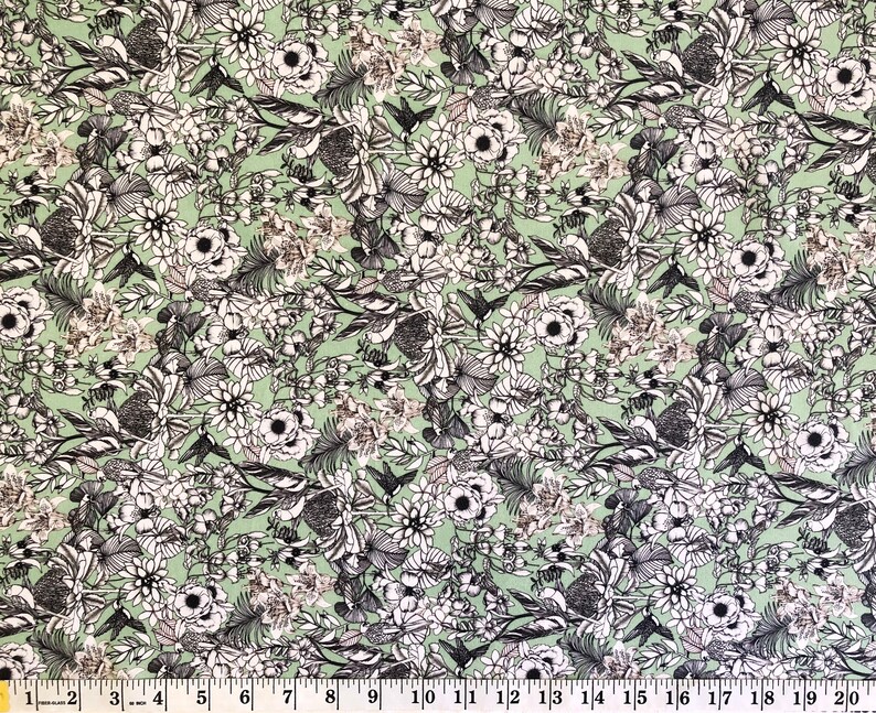 "Fabric pattern featuring 'The Scenic Route' design by talented Australian artist Victoria McGrane. The print showcases a light green background adorned with detailed, sketch-style black and white illustrations of lush tropical flora, including orchids and ferns, beautifully interspersed with scenic birds like parrots."