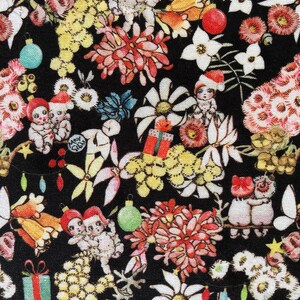 May include: A black fabric with a repeating pattern of colourful flowers, butterflies, and Christmas decorations. There are also small figures of children wearing Santa hats.