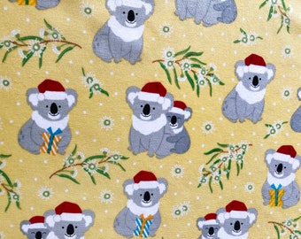 Koalas mum & baby in Christmas hat and eucalyptus flower yellow quilting cotton fabric by 1/2 yard or Fat quarter, Aussie animal Christmas