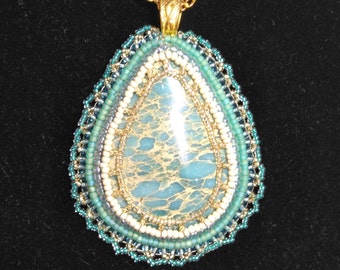 Turquoise pear shaped sea sediment Jasper pendant