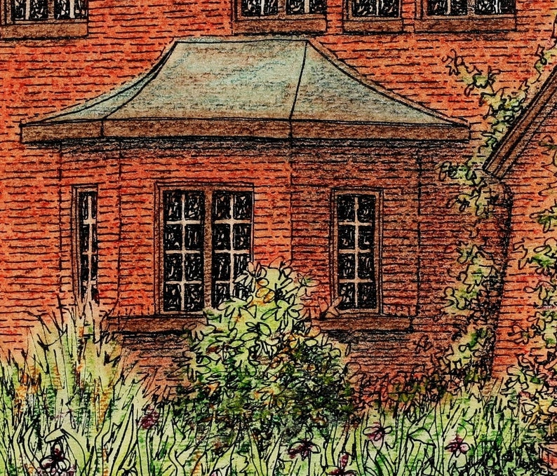 May include: A brick building with a green roof and windows. The building is surrounded by green plants and flowers.