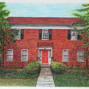 May include: A red brick house with a red door and white trim. The house has a green roof and two large trees on either side.