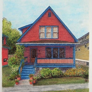 May include: A red house with a blue roof and white trim. The house has a porch with a blue railing and a white picket fence. There are green bushes and flowers in front of the house.