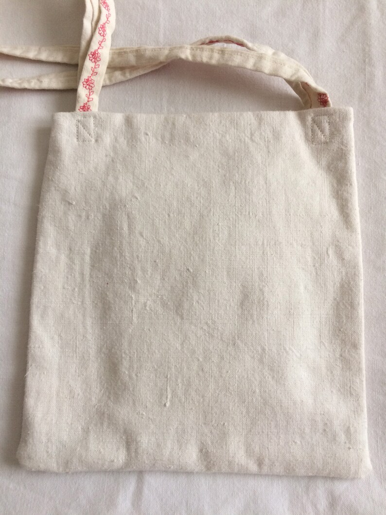 Vintage linen tote bag in faded roses with embroidered handles