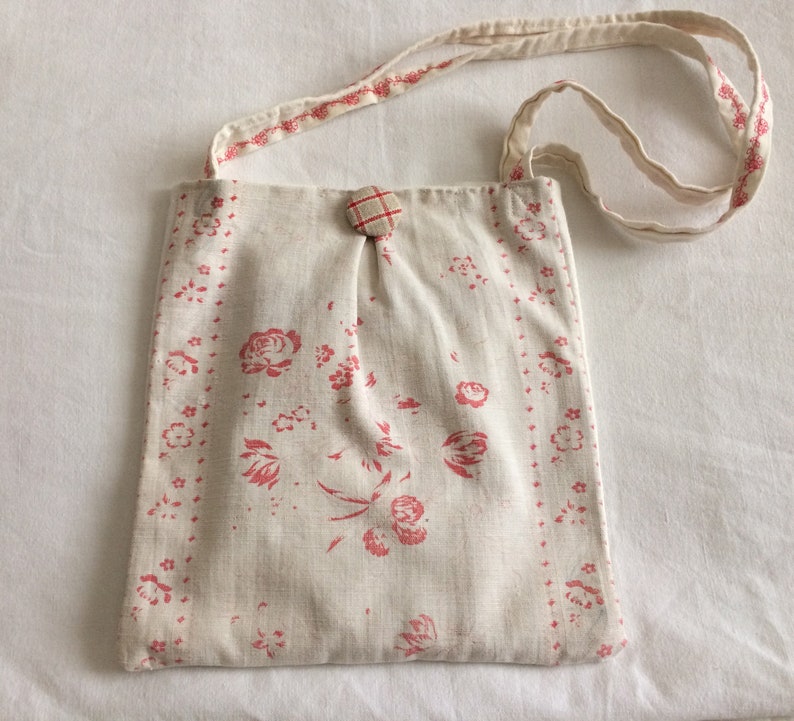 Vintage linen tote bag in faded roses with embroidered handles