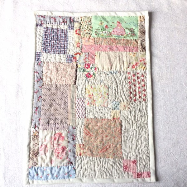 Miniature quilt from vintage patchwork pieces