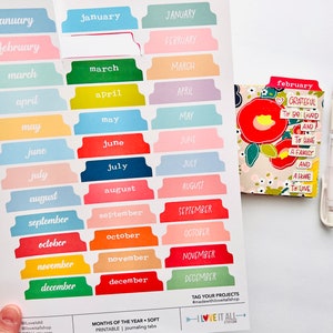 May include: Printable monthly tab dividers for a planner or journal. The tabs are colorful and feature the months of the year in a handwritten font. The tabs are designed to be used with a standard size planner or journal.
