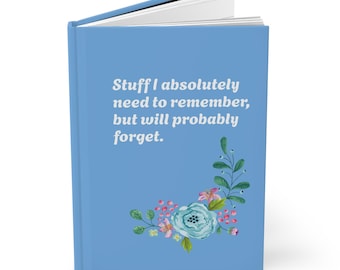 May include: A light blue journal with the text "Stuff I absolutely need to remember, but will probably forget." A floral design with a blue flower and pink berries decorates the corner.