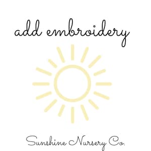 May include: Add embroidery to your order with Sunshine Nursery Co. A yellow sun with rays is the logo for this shop.