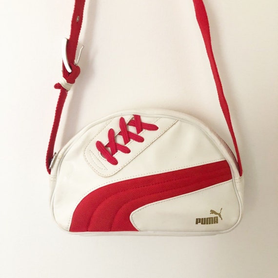 puma gold and white purse