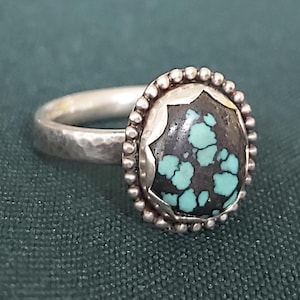 Handmade size N sterling silver turquoise ring with textured band and oxidisation