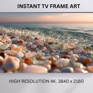 May include: A framed print featuring a beach scene with a close-up of colorful pebbles, seashells, and clear water. The text "INSTANT TV FRAME ART" and "HIGH RESOLUTION 4K. 3840 x 2160" are displayed at the top and bottom of the image.