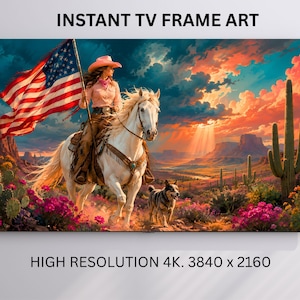 May include: Instant TV Frame Art featuring a digital illustration of a person in a pink hat riding a white horse while holding an American flag. A dog walks nearby in a desert landscape with cacti, pink flowers, and a sunset sky. Text: INSTANT TV FRAME ART.