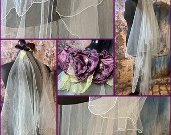 Ivory veil with purple fabric flowers