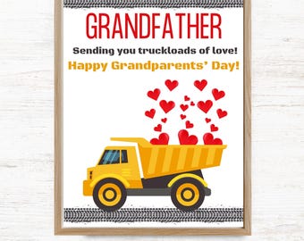 May include: A framed print featuring a yellow dump truck carrying red hearts. The text reads: GRANDFATHER, Sending you truckloads of love!, Happy Grandparents' Day!. The design includes black tire tracks at the top and bottom of the white background.