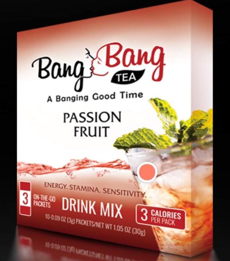 May include: A box of Bang Tea drink mix in Passion Fruit flavor. The box is red with a white and black logo. It says "Bang Bang Tea" and "A Banging Good Time". The box also shows a glass of the drink with ice and a sprig of mint. The box contains 3 packets of drink mix, each containing 0.09 ounces of mix. The net weight of the box is 1.05 ounces.