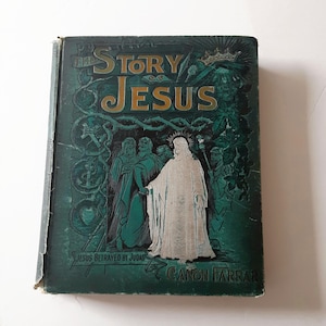 May include: Vintage book titled "The Story of Jesus" with a green cover. The cover features gold lettering and an illustration of Jesus with other figures. The text "Jesus Betrayed by Judas" is also visible.
