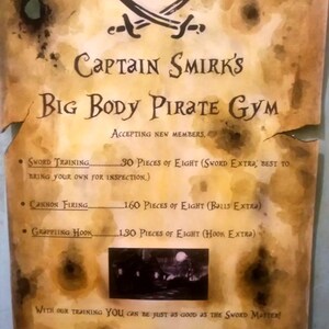 May include: Aged parchment-style poster for Captain Smirk's Big Body Pirate Gym, with crossed swords and text. The poster lists training options: sword training, cannon firing, and grappling hook. The gym is accepting new members.