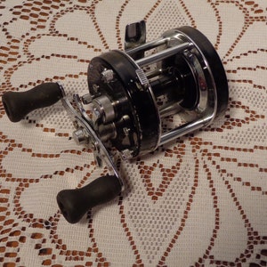 1957 vintage 1st ABU spin-casting reel models: the Abumatic 30