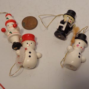 Christmas Ornaments and Figurines - Four Wood Christmas Figurines. NOS - 25-074