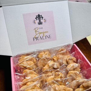 NOLA’s Sweetest Secret — Pecan Pralines Made Like Ya Momma’s, Dressed in Boujee.
