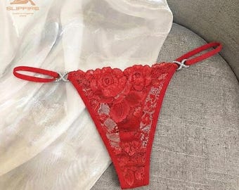 Calcinha fio dental feminina em renda transparente, modelo fio dental de cintura baixa, lingerie de renda ultrafina, calcinha leve e elástica, lingerie minimalista.